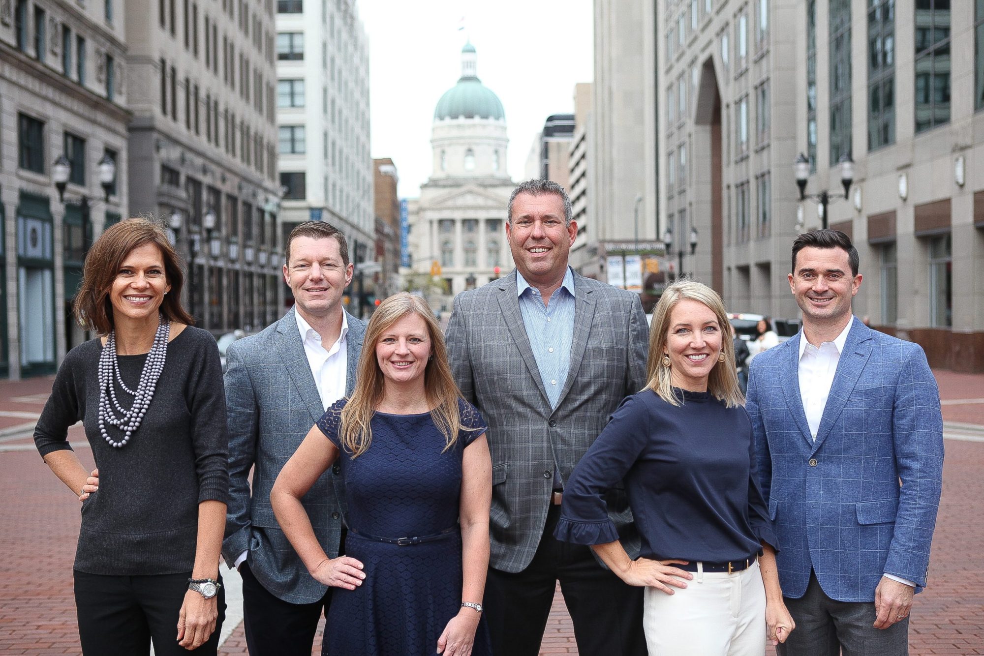 Holistic Financial Partners in a group photo on Market Street in Downtown Indianapolis