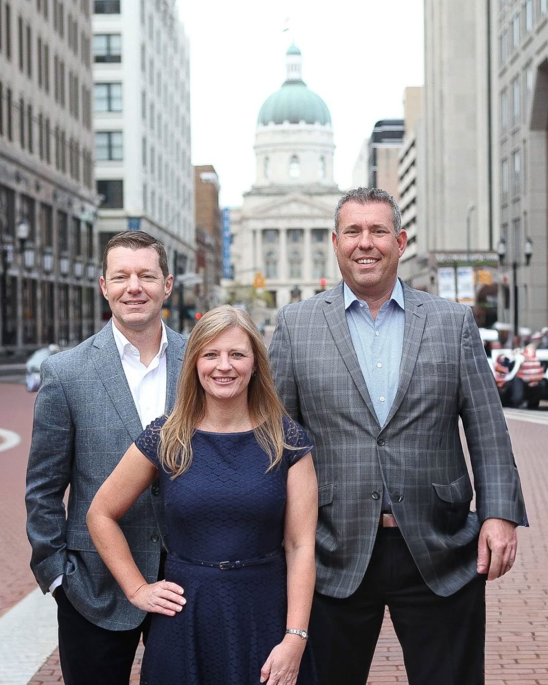 Holistic Financial Partners in a group photo on Market Street in Downtown Indianapolis